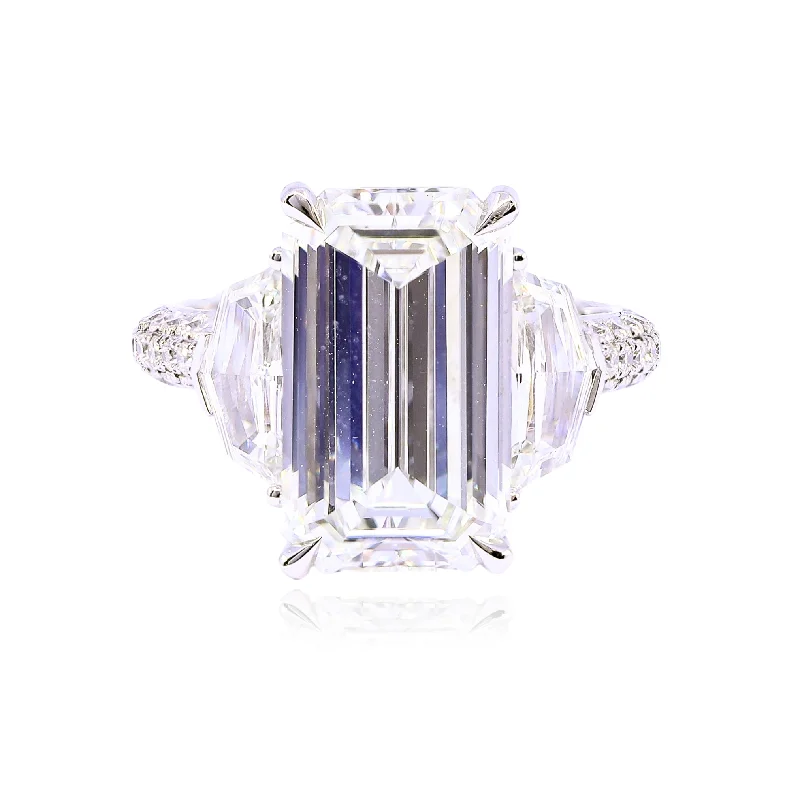 PLATINUM 6.07CT EMERALD-CUT DIAMOND AND CADILLAC SIDE DIAMOND THREE-STONE ENGAGEMENT RING